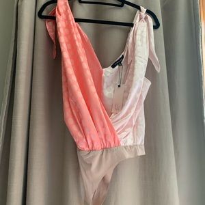 Pink new with tags bodysuit